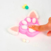 Игрушка-антистресс сквиш "Лапка с ушками" 10х6см с помпонами, розовая FX5729 от магазина "Карандаш"