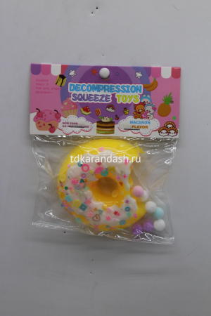 Игрушка-антистресс сквиш "Пончик" 8см с помпонами и пайетками, 4 цвета FX5743 от магазина "Карандаш"